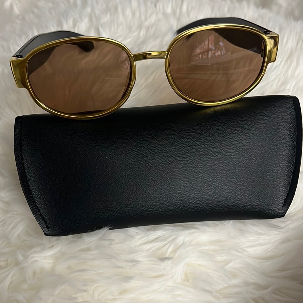 Oval sunglasses. NWOT